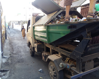 Vehicles for transportation of waste from residential areas to land-fill area at Marten
