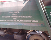 Vehicles for transportation of waste from commercial areas to land-fill area at Marten